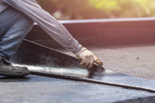 Professional Exterior Waterproofing technician working in Orleans, MI